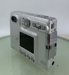 KONIKA MINOLTA DIMAGE XT CAMERA SILVER WITH BOX AND CHARGER - TESTED - 2936