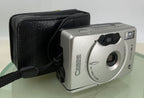 CANON IXUX M1 SILVER DIGITAL CAMERA WITH COVER - TESTED - 9870