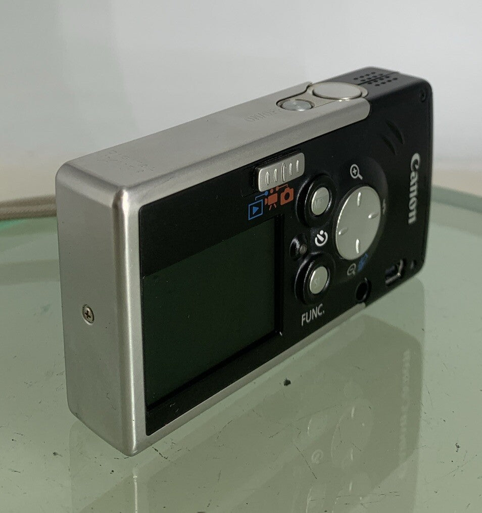 Canon Digital Camera IXUS i PC1060 4.0MP BLACK+CHARGER+COVER TESTED - 9974