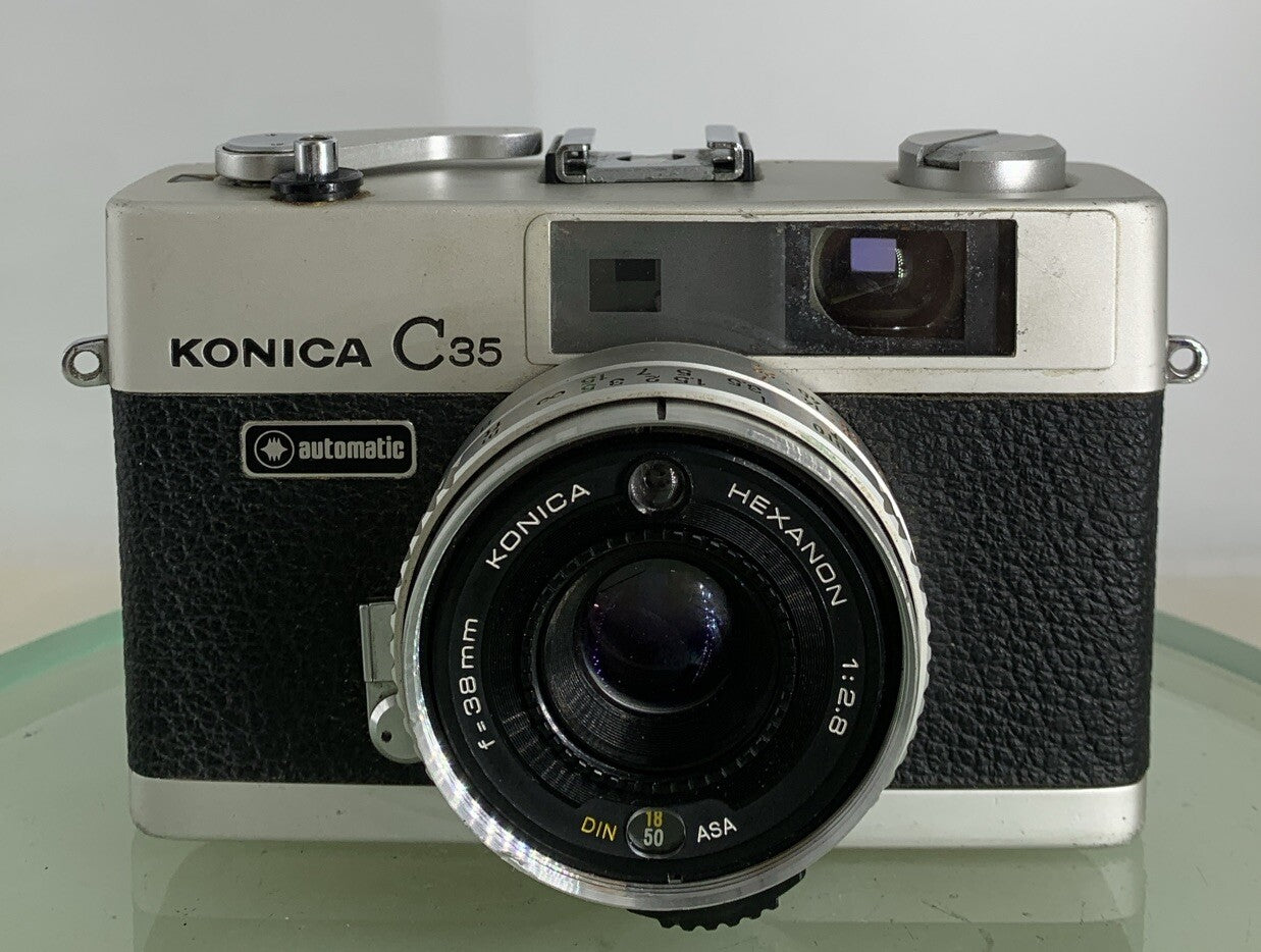 Konica C35 AUTOMATIC BLACK GOOD CONDITION POINT AND SHOOT CAMERA TESTED - 7661