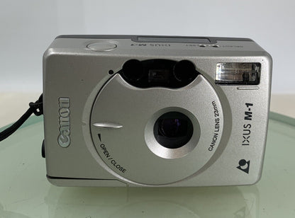CANON IXUX M1 SILVER DIGITAL CAMERA WITH COVER - TESTED - 9871