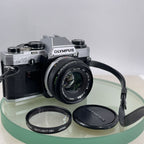 BOXED Olympus OM10 35mm SLR Film Camera with 50mm Lens + Leather Case+T20 FLASH+2