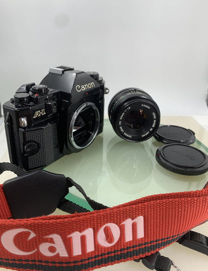 Canon A-1 35mm SLR Film Camera + FD 50mm f/1.8 Prime Lens BOXED, BOOK, STRAP#8061