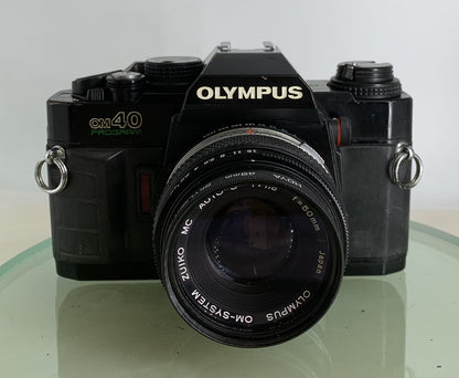 Olympus OM40 Program 35mm Film Camera + Olympus 50mm F/1.8 Zuiko Lens  #1901