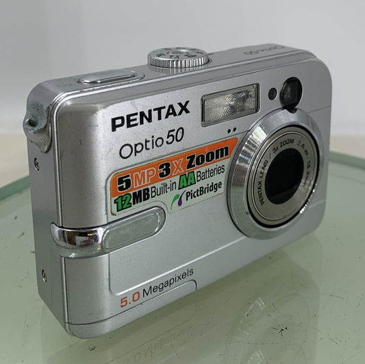 Pentax Optio 50L 5.0MP Digital Camera - Silver NO CHARGER NO CARD TESTED - 310