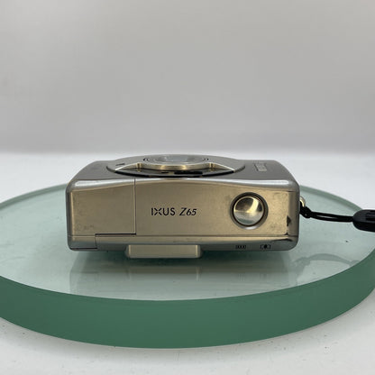 CANON IXUS Z65 QUARTZ DATE~PANORAMA APS FILM CAMERA~24-65MM LENS~ORG CASE#1914