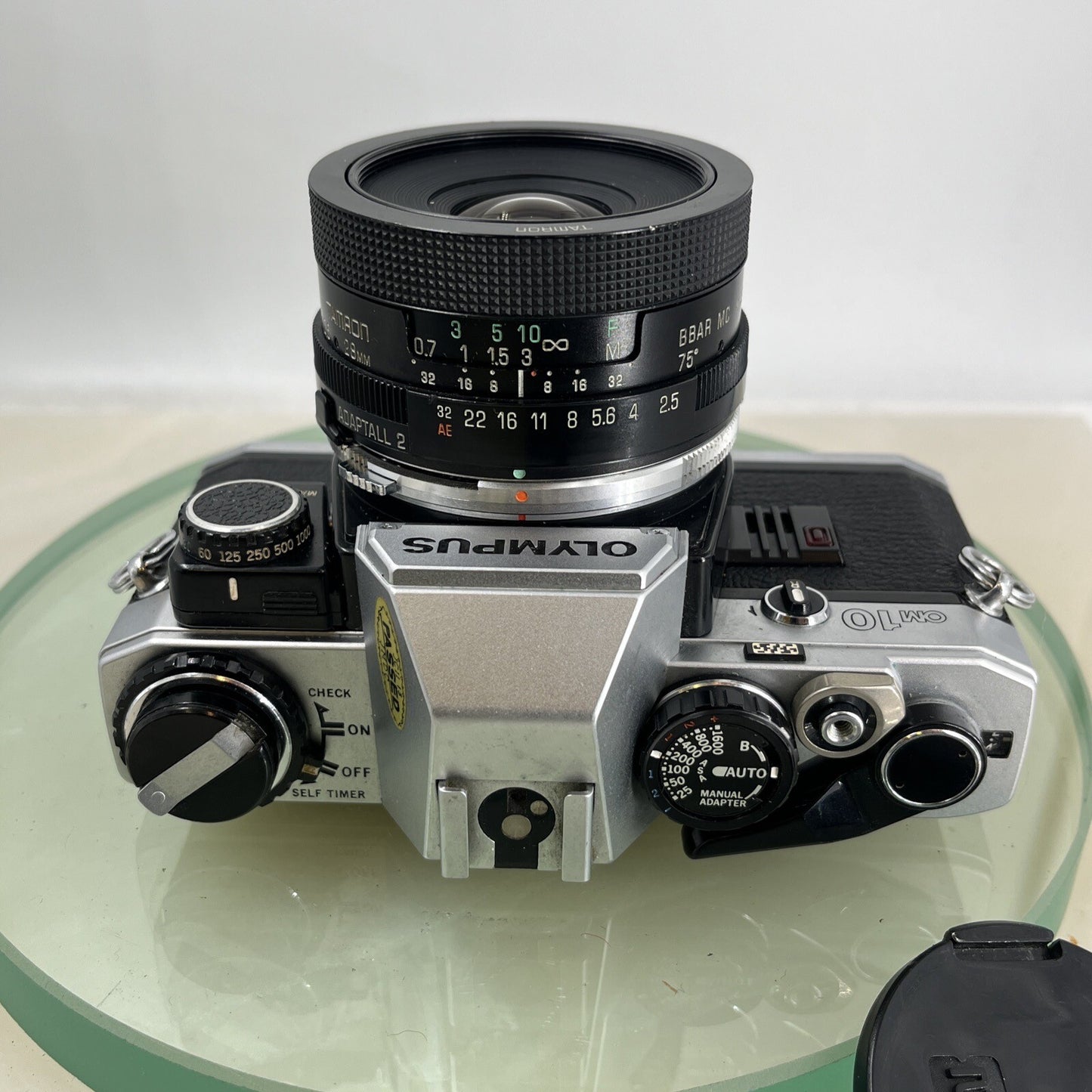 Olympus OM10 35mm SLR Film Camera + 28mm f2.5 Tamron  Lens and Manual Adapter9037