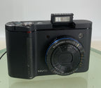 SAMSUNG NV10 DIGITAL CAMERA BLACK + CHARGER + COVER NO CARD TESTED - 4581