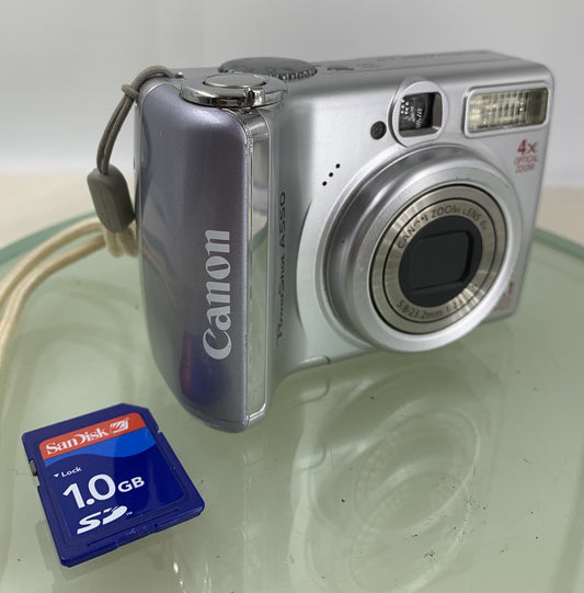 CANON POWERSHOT A550 7.1MP CAMERA WITH 1.0GB SD CARD SILVER TESTED - 8750