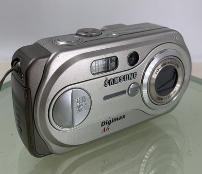 Samsung DIGIMAX COMPACT DIGITAL CAMERA A6 NOCARD NO CHARGER SILVER TESTED - 5500