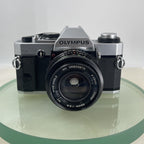 Olympus Om20 35mm slr film camera With Vivitar 28mm 1:2.8  Lens SERVICED  #6201