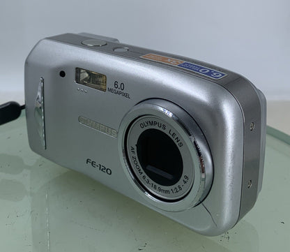 Olympus FE-120 6MP COMPACT DIGITAL CAMERA SILVER WITH COVER + WIRE TESTED - 462