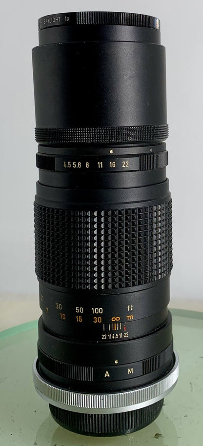Canon Lens FL 200mm 1:4,5 in extremely good condition FD Comes with case GREAT112