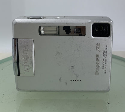 KONIKA MINOLTA DIMAGE XT CAMERA SILVER WITH BOX AND CHARGER - TESTED - 2931