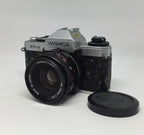 YASHICA FX-D QUARTZ 35mm FILM SLR CAMERA WITH YASHICA 50mm F/1.9 ML Lens 122