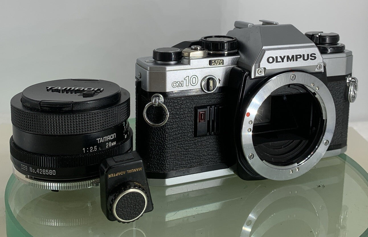 SERVICED Olympus OM10 35mm SLR Film Camera + 28mm f2.5 Tamron  Lens + Adapter1990