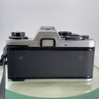 Olympus OM10 35mm Film SLR Manual Camera + Olympus 50/1.8 Zuiko Lens - Silver6094
