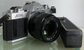Canon AV-1 SLR 35mm Film Camera With a Canon 50mm 1.8 Lens + Battery Grip TESTED0