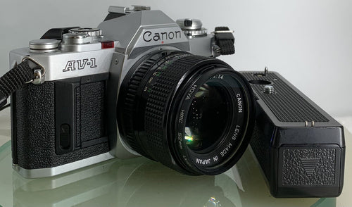 Canon AV-1 SLR 35mm Film Camera With a Canon 50mm 1.8 Lens + Battery Grip TESTED0