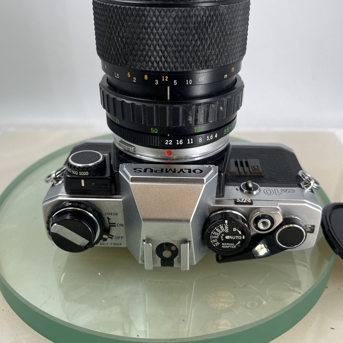 Olympus OM10 35mm SLR Film Camera + Zuiko 35-70mm f4 Lens and Manual Adapter9105