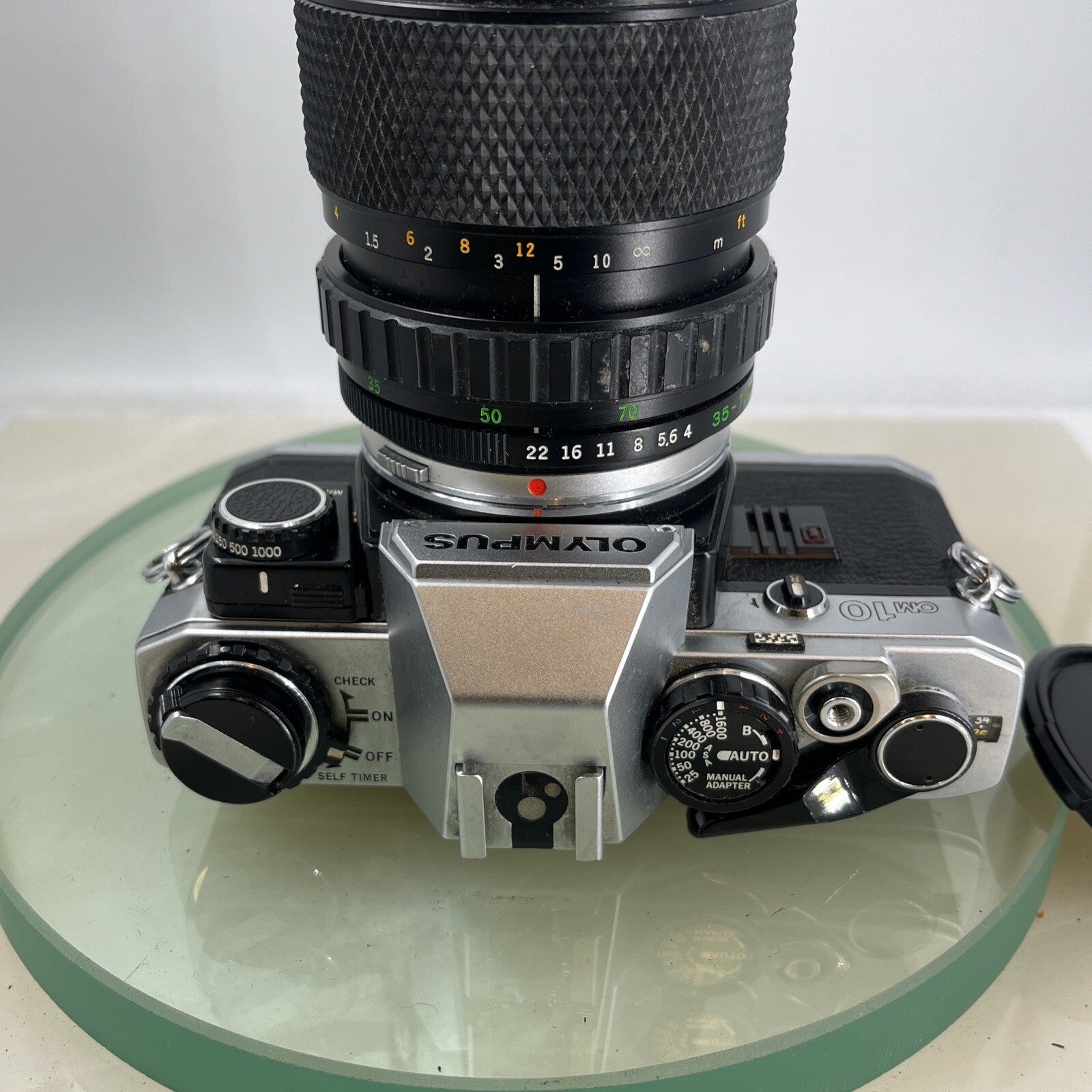 Olympus OM10 35mm SLR Film Camera + Zuiko 35-70mm f4 Lens and Manual Adapter9105