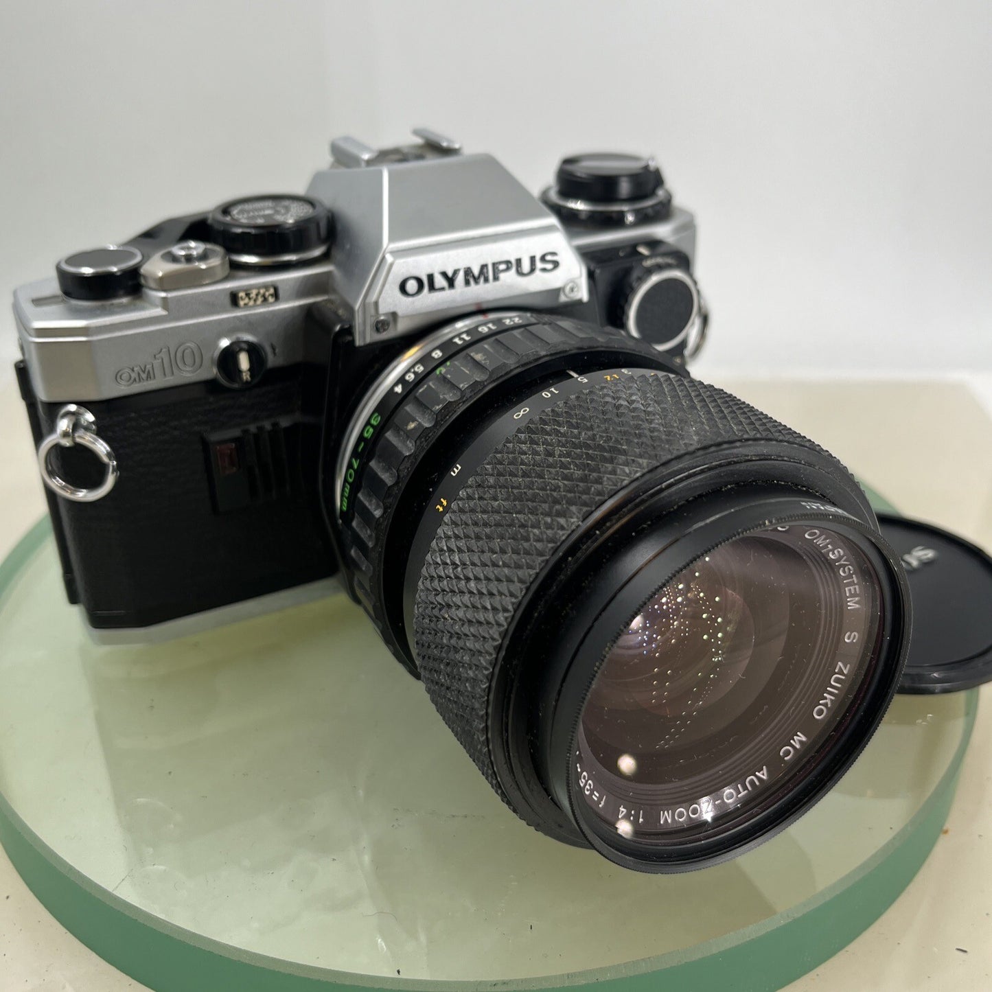 Olympus OM10 35mm SLR Film Camera + Zuiko 35-70mm f4 Lens and Manual Adapter9100