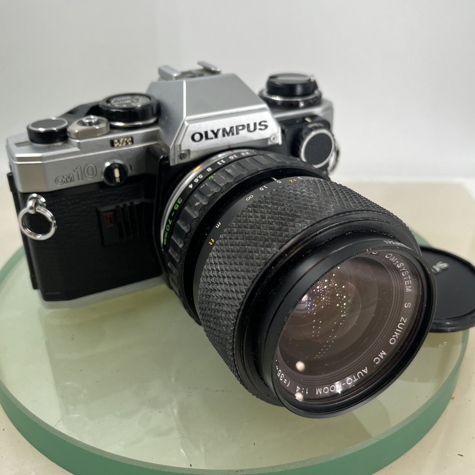 Olympus OM10 35mm SLR Film Camera + Zuiko 35-70mm f4 Lens and Manual Adapter9100
