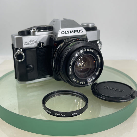 Olympus Om20 35mm slr film camera With Vivitar 28mm 1:2.8  Lens SERVICED  #6200
