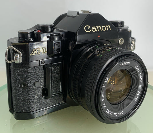 Canon A-1 35mm SLR Camera Body+ FD 50mm f/1.8 FULLY SERVICED THE CAMERA  & LENS0