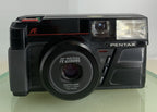 PENTAX IQ Zoom 35 mm Film POINT AND SHOOT CAMERA BLACK NO BATTERY - TESTED - 8471