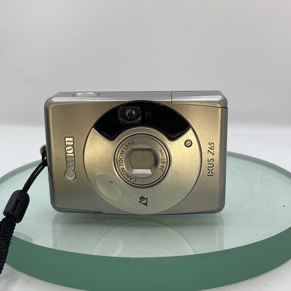 CANON IXUS Z65 QUARTZ DATE~PANORAMA APS FILM CAMERA~24-65MM LENS~ORG CASE#1911