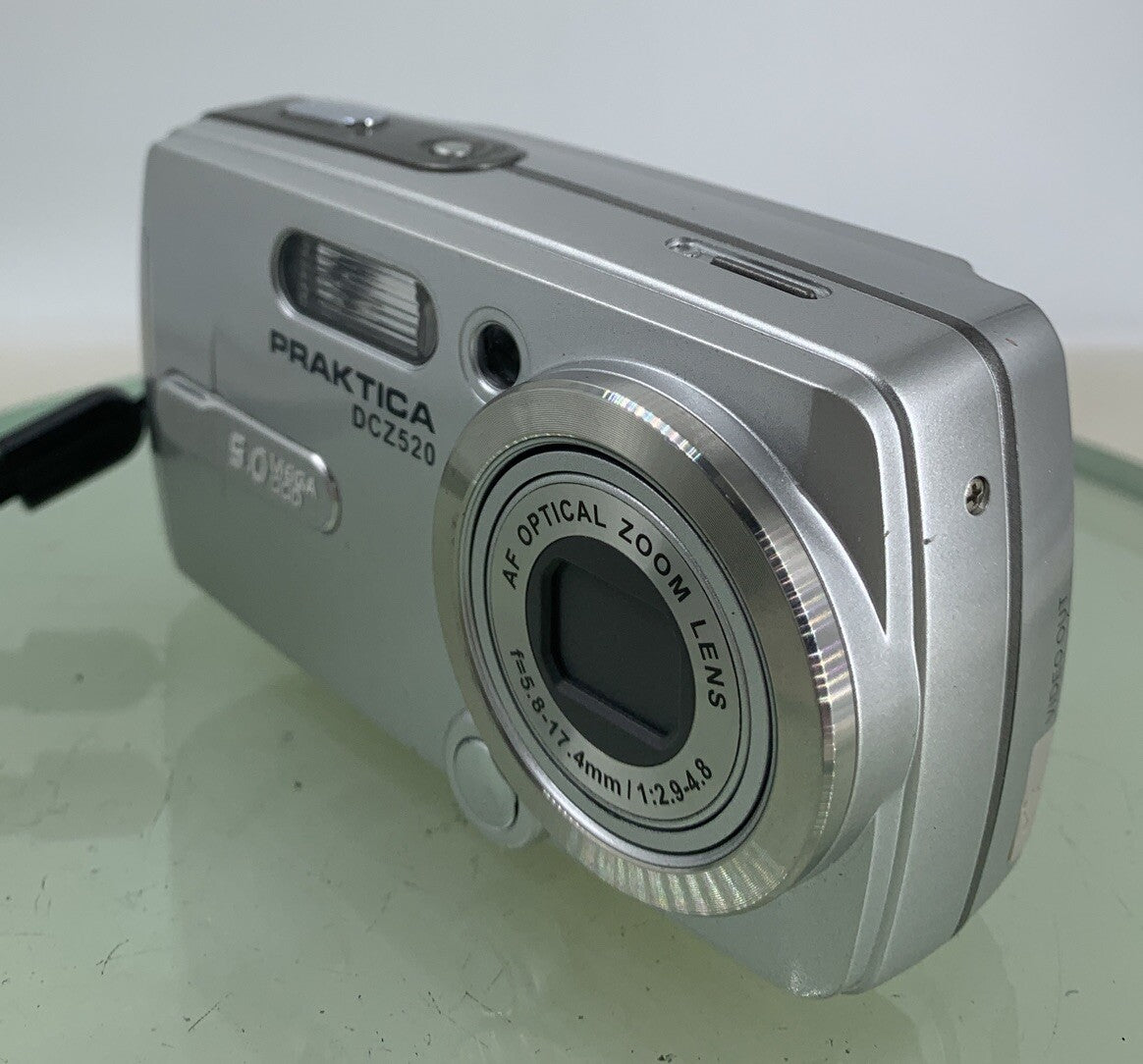 Praktica DCZ-520 5.1MP COMPACT DIGITAL CAMERA SILVER WITH COVER TESTED- 1102