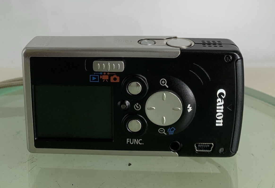 Canon Digital Camera IXUS i PC1060 4.0MP BLACK+CHARGER+COVER TESTED - 9975