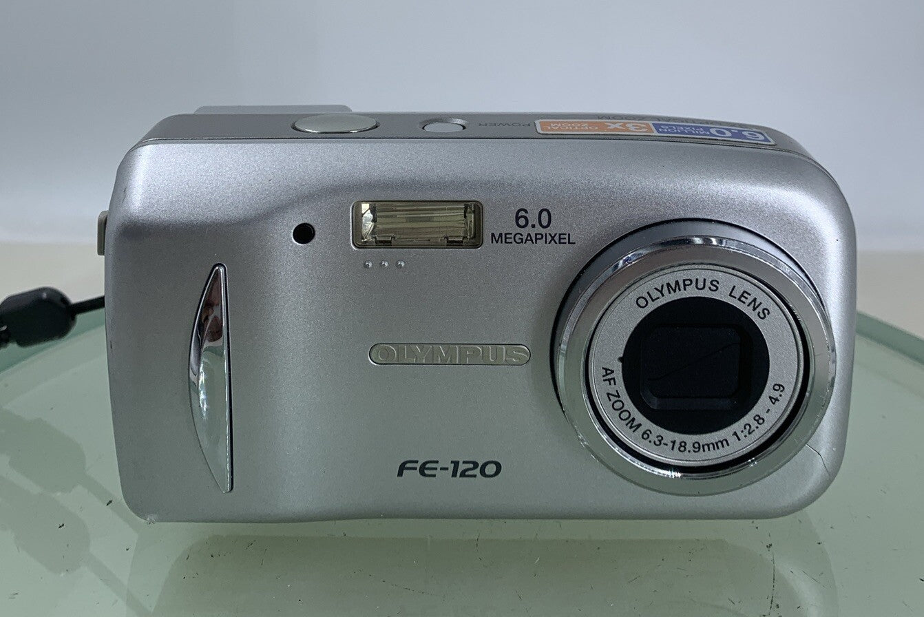 Olympus FE-120 6MP COMPACT DIGITAL CAMERA SILVER WITH COVER + WIRE TESTED - 461