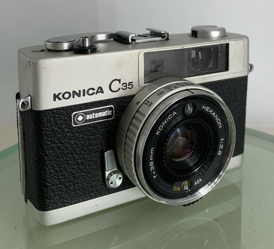 Konica C35 AUTOMATIC BLACK GOOD CONDITION POINT AND SHOOT CAMERA TESTED - 7660